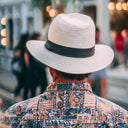 Man wearing white summer hat