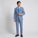 Edison Windowpane Check Jacket Blue | Place the product on to a male model standing in a studio on a light grey background.