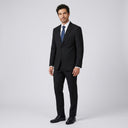Greyson Fine Twill Jacket Black | Place the product on to a male model standing in a studio on a light grey background.