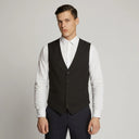 Harry Super Fine Twill Plain Vest BLACK | A man wearing this vest. He should be standing on a light grey studio background.