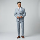 Jackson 1 Button Jacket - Sky | Place the product on to a male model standing in a studio on a light grey background.