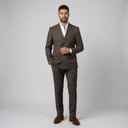 Kennedy Double Breasted Jacket | Place the product on to a male model standing in a studio on a light grey background.