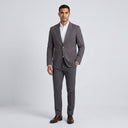 Ledger Peach Finish Fine Cotton Drill Slim Fit Jacket - Charcoal | Place the product on to a male model standing in a studio on a light grey background.