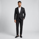 Leonardo Brocade Dinner Jacket Black | Place the product on to a male model standing in a studio on a light grey background.
