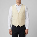 Matteo Men's 5B Wool Blend With Stretch Vest 1 Oatmeal | A man wearing this vest. He should be standing on a light grey studio background.