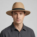 Men's Felt Fedora Hat BEIGE | Place this hat on the head of a male. The image should be taken in a studio setting on a light grey backround.