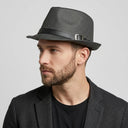 Men's Summer Trilby STRAW BLACK WITH LEATHER | Place this hat on the head of a male. The image should be taken in a studio setting on a light grey backround.