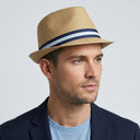 Men's Summer Trilby STRAW BROWN | Place this hat on the head of a male. The image should be taken in a studio setting on a light grey backround.