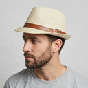 Men's Summer Trilby STRAW CREAM WITH LEATHER | Place this hat on the head of a male. The image should be taken in a studio setting on a light grey backround.