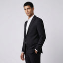 Oscar Pure Wool Jacket Black | Same as first image, but have the model standing side on or at an alternative angle towards the camera.