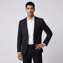 Oscar Pure Wool Jacket Black | Same again, but the model is now standing in a completely different pose.