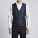 Paisley Vest NAVY | A man wearing this vest. He should be standing on a light grey studio background.