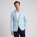 Quinn Mens Jacket Ice (50) | Place the product on to a male model standing in a studio on a light grey background.