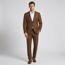 Theo Men's 2B Jacket Brown | Place the product on to a male model standing in a studio on a light grey background.