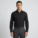 William Bamboo Stretch Shirt Black | Man wearing this formal long sleeve shirt.